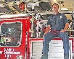 The National Geographic Channel episode of the 'Dog Whisperer' will chronicle the training of 'Wilshire,' pictured above with firefighter Ryan Penrod. The National Geographic Channel episode of the 'Dog Whisperer' will chronicle the training of 'Wilshire,' pictured above with firefighter Ryan Penrod.