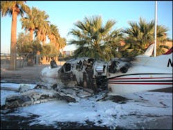 The cabin area of the twin engine plane burst into flames upon impact with the ground.
