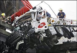 An accident left this truck hanging off a New Orleans overpass. An accident left this truck hanging off a New Orleans overpass.