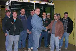 Niles English, President of Laceyville's Good Will Fire Company, front left, shakes hands with Chris Kemmerling, President of the Clover Volunteer Fire Company in Schuylkill County Wednesday night when Laceyville donated its 1987 KME pumper (seen behind the group) to Clover. Niles English, President of Laceyville's Good Will Fire Company, front left, shakes hands with Chris Kemmerling, President of the Clover Volunteer Fire Company in Schuylkill County Wednesday night when Laceyville donated its 1987 KME pumper (seen behind the group) to Clover.