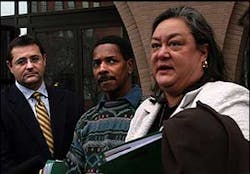 Ellreese N. Daniels, center, stands between his lawyer, Tina Hunt, and federal investigator Thomas Krzyzanek, after appearing in Federal Court, Jan. 4. Ellreese N. Daniels, center, stands between his lawyer, Tina Hunt, and federal investigator Thomas Krzyzanek, after appearing in Federal Court, Jan. 4.