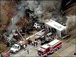 The crash involves two trucks and a car; smoke from the resulting fire could be seen for miles. The crash involves two trucks and a car; smoke from the resulting fire could be seen for miles.