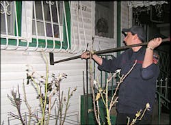 firefighter uses the homemade window bar forcible entry tool designed by FDNY Ladder 126. firefighter uses the homemade window bar forcible entry tool designed by FDNY Ladder 126.