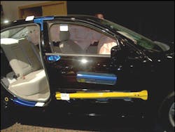 With the outer door panel cut away, it is possible to see the location of the two door collision beams on the Fusion. Note that all the exposed blue metal in this auto show display represents where ford has placed multiple layers of high-strength steel so their vehicle can meet the 2007 Federal crash standards.