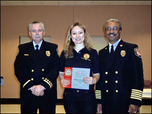 Citizens Fire Academy Director Tim Szymanski (left) and Las Vegas Fire