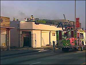 About 50 firefighters were deployed to help extinguish the blaze, which spread through the ceiling and onto the roof.