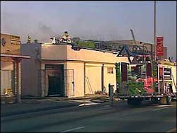 About 50 firefighters were deployed to help extinguish the blaze, which spread through the ceiling and onto the roof. About 50 firefighters were deployed to help extinguish the blaze, which spread through the ceiling and onto the roof.