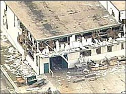 The explosion ripped the building's walls and windows apart. The explosion ripped the building's walls and windows apart.