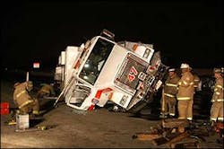 The truck was responding to a crash when it was struck from behind, injuring four firefighters. The truck was responding to a crash when it was struck from behind, injuring four firefighters.