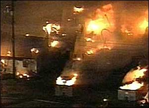 Columns of flames shot high into the air and smoke covered the sky.