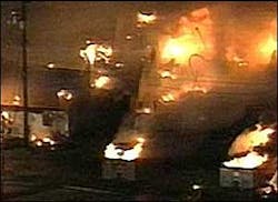 Columns of flames shot high into the air and smoke covered the sky. Columns of flames shot high into the air and smoke covered the sky.