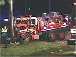 Two firefighters were hospitalized after a car slammed into their brush truck. Two firefighters were hospitalized after a car slammed into their brush truck.