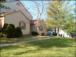 Photo 4a - With no access for apparatus at the rear of this housing complex in Burtonsville, MD, firefighters had an unusually long hose stretch around the structure.