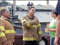 Vincente Cabrera, a firefighter from Guatemala City, gives a thumbs-up after being told he would get an opportunity to go up the ladder on one of Waukesha’s fire engines. Vincente Cabrera, a firefighter from Guatemala City, gives a thumbs-up after being told he would get an opportunity to go up the ladder on one of Waukesha’s fire engines.