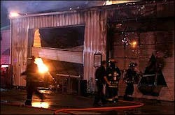 Kokomo firefighters battle a blaze as it engulfs the city's Emergency Management Agency's building. Kokomo firefighters battle a blaze as it engulfs the city's Emergency Management Agency's building.