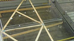The truss pass through a second press and is then ready to be shipped for assembly at the construction site.