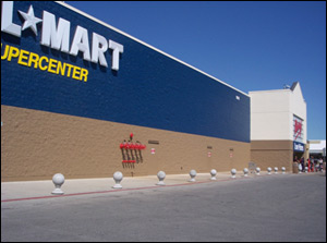 Due to the possibility of encountering an inoperable sprinkler system, all large enclosed structures whether protected or unprotected should be managed in the same manner.