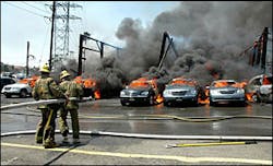 Los Angeles firefighters try to extinguish a fire at a warehouse in Los Angeles on Sunday May 27, 2007. Los Angeles firefighters try to extinguish a fire at a warehouse in Los Angeles on Sunday May 27, 2007.