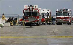 Members from the Milwaukee Fire Department stage near the boat launch at the Mckinley Marina on Lake Michigan.