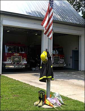 A memorial on the flagpole of station No. 16 on Ashley Hall Plantation Road in Charleston, S.C.