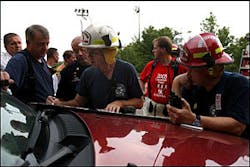 Firefighters get their assignments from a commander at one of the staging areas. Firefighters get their assignments from a commander at one of the staging areas.