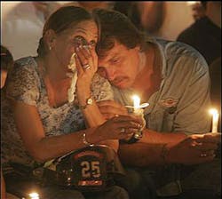Tracey and Rick Bales, of Flint, shed tears over the loss of their son Austin Cheek