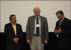 Dr. Burton Clark, center, is flanked by NFFF Executive Director Ron Siarnicki, left, and USFA Administrator Gregory Cade Dr. Burton Clark, center, is flanked by NFFF Executive Director Ron Siarnicki, left, and USFA Administrator Gregory Cade