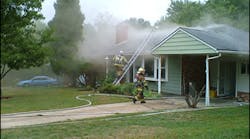 Firefighters operate at a basement fire in a single-family dwelling in Calverton, MD. Crews need to re-evaluate the tactics used in both residential and commercial structures, because these unwanted spaces are being used for living and storage areas.