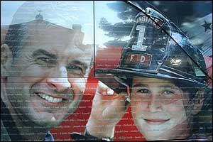 The steeple of the National Fallen Firefighters' Chapel is reflected on the bus that contained the names of 3,147 fallen heroes.