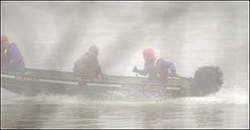 Sugar Creek Water Rescue members transport Ted Kuhn back to the Michael Hunter Kearns public access site boat ramp Tuesday near Tecumseh after they pulled Kuhn from the Wabash River. Sugar Creek Water Rescue members transport Ted Kuhn back to the Michael Hunter Kearns public access site boat ramp Tuesday near Tecumseh after they pulled Kuhn from the Wabash River.