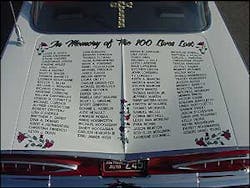 The trunk bears the names of the fire victims.