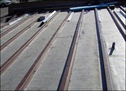 An EDPM membrane with and hat channels over existing deck. A metal roof will be attached to the hat channels. An EDPM membrane with and hat channels over existing deck. A metal roof will be attached to the hat channels.