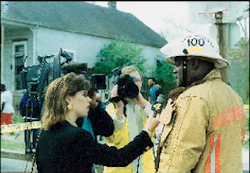 Warren McDaniels speaks with the media during a fire in his tenure as New Orleans Fire Superintendent.