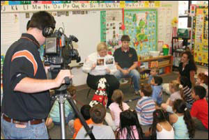 Author Dayna Hilton and Johnson County Firefighter Michael Post, read the new book to Mrs. Kelli Grigsby's kindergarten class at Clarksville Primary in Arkansas.