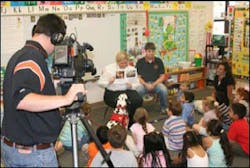 Author Dayna Hilton and Johnson County Firefighter Michael Post, read the new book to Mrs. Kelli Grigsby's kindergarten class at Clarksville Primary in Arkansas. Author Dayna Hilton and Johnson County Firefighter Michael Post, read the new book to Mrs. Kelli Grigsby's kindergarten class at Clarksville Primary in Arkansas.