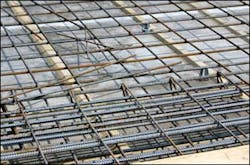 Steel is a common product used to reinforce concrete and this &apos;rebar&apos; is put in place prior to the concrete being poured.