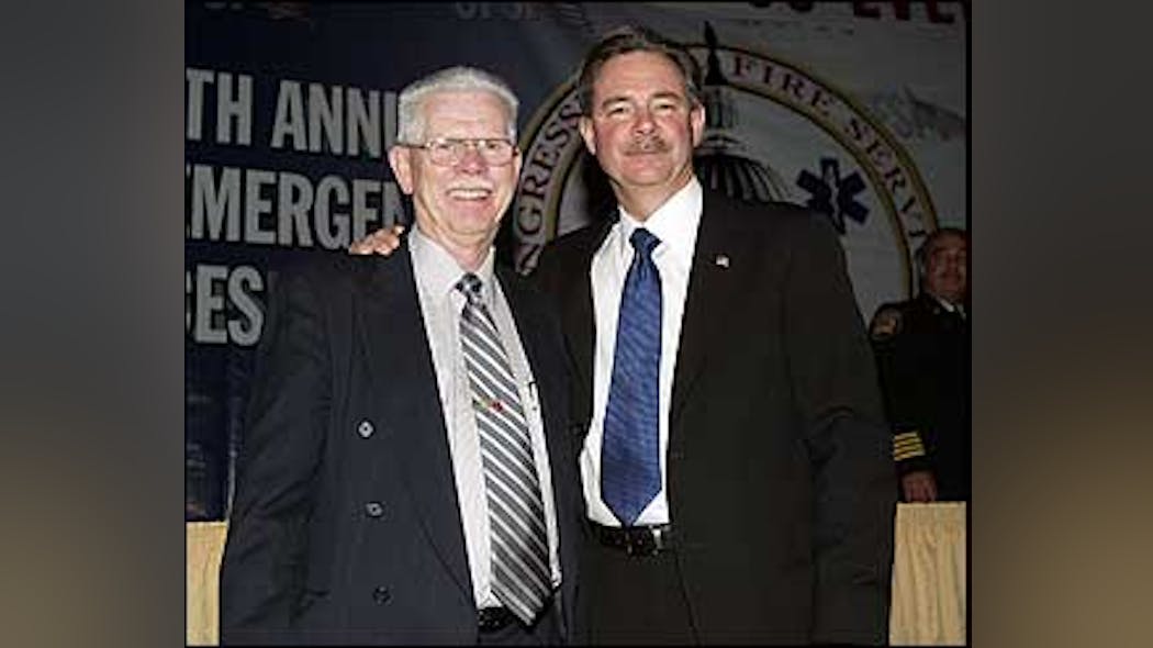 USFA Deputy Administrator Charlie Dickinson, left, with FEMA head R. David Paulison.