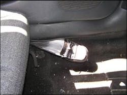 Close scrutiny of the patient's area of the vehicle showed that her missing shoe was still in its' crushed location. After door override, the door actually settled down onto her left foot. The shoe was pinched between the bottom of the door and the inside edge of the rocker. Close scrutiny of the patient's area of the vehicle showed that her missing shoe was still in its' crushed location. After door override, the door actually settled down onto her left foot. The shoe was pinched between the bottom of the door and the inside edge of the rocker.