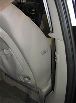 It is only after you snoop around and look closely that you see evidence of an undeployed seat-mounted airbag in this front seat. The airbag ID is thread embroidered into the upholstery of the seat fabric itself.