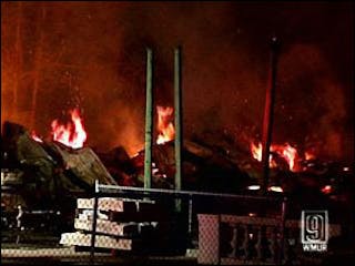 A six-alarm fire tore through a South Hampton antique warehouse Tuesday night.
