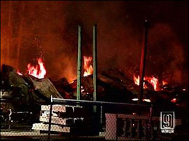 A six-alarm fire tore through a South Hampton antique warehouse Tuesday night.