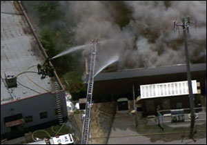 Four firefighters went up on the roof, but it soon collapsed.