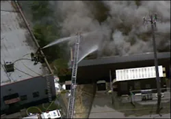 Four firefighters went up on the roof, but it soon collapsed.