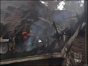 One firefighter was injured falling down a flight of stairs.