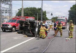 Firefighter Chris Hickman lifted the SUV about 12 inches off the ground, allowing other firefighters to free the driver's arm. Firefighter Chris Hickman lifted the SUV about 12 inches off the ground, allowing other firefighters to free the driver's arm.