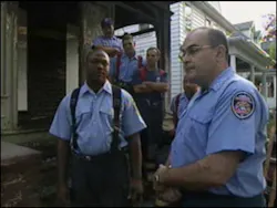 Rochester Firefighters pulled three people from a burning house Wednesday with only minutes to spare.