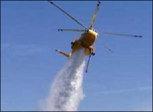 As many as nine U.S. Forest Service personnel are missing following a helicopter crash on Tuesday that injured four firefighters.