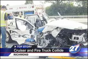 The officer was responding to a crash when he crashed into a fire truck.