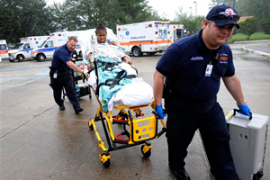 Paramedics return one of 75 patients to Trinity Neurologic Rehabilitation Center in Slidell, La., Tuesday, Sept. 2, 2008.