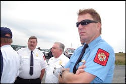 Shanksville Chief Terry Shaffer, left, talks with Central City Chief William Russian, while Brad Zearfoss watches the ceremonies. Shanksville Chief Terry Shaffer, left, talks with Central City Chief William Russian, while Brad Zearfoss watches the ceremonies.